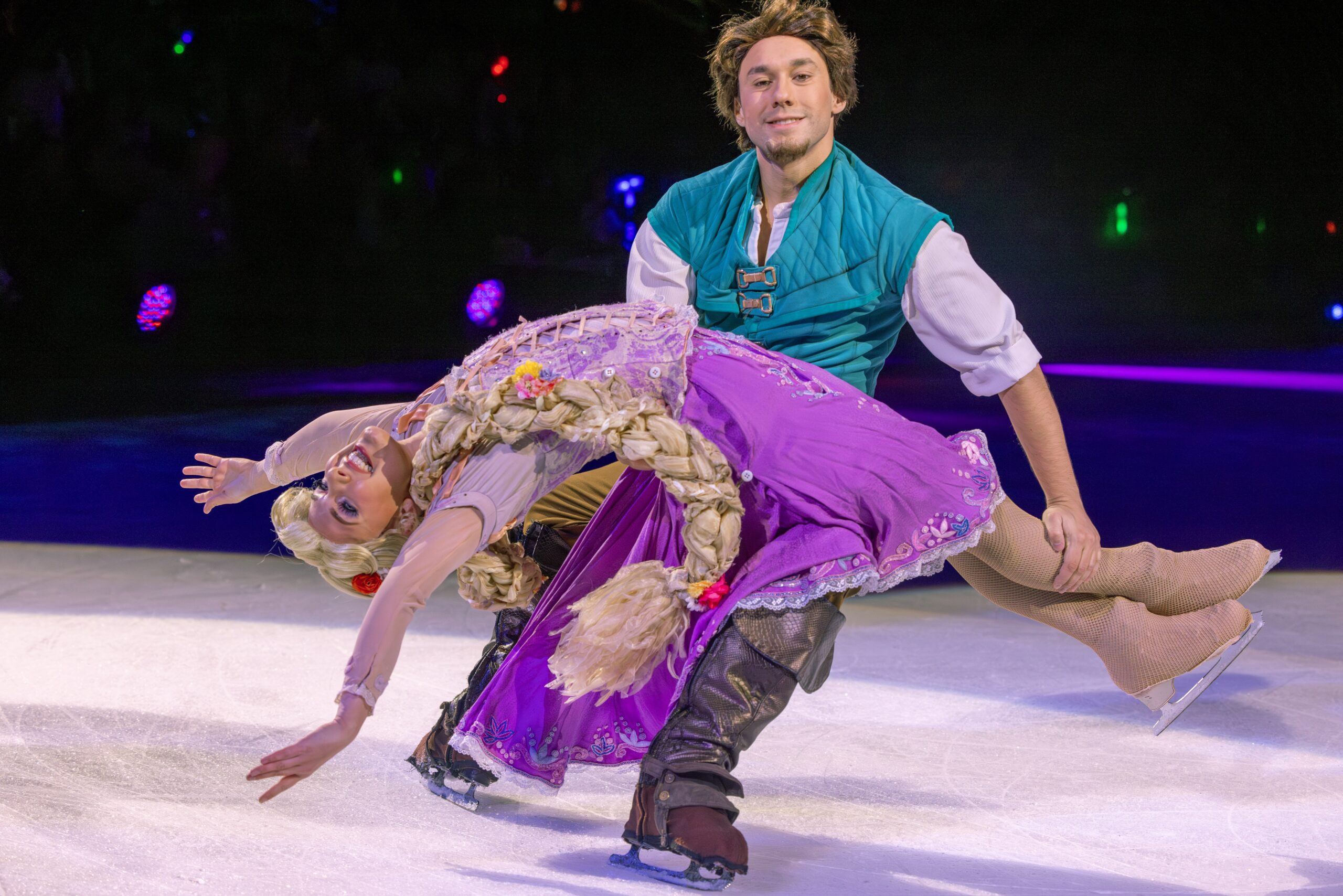 2 The Tangled Protagonists Captivate The Crowd With Their Charm. Min