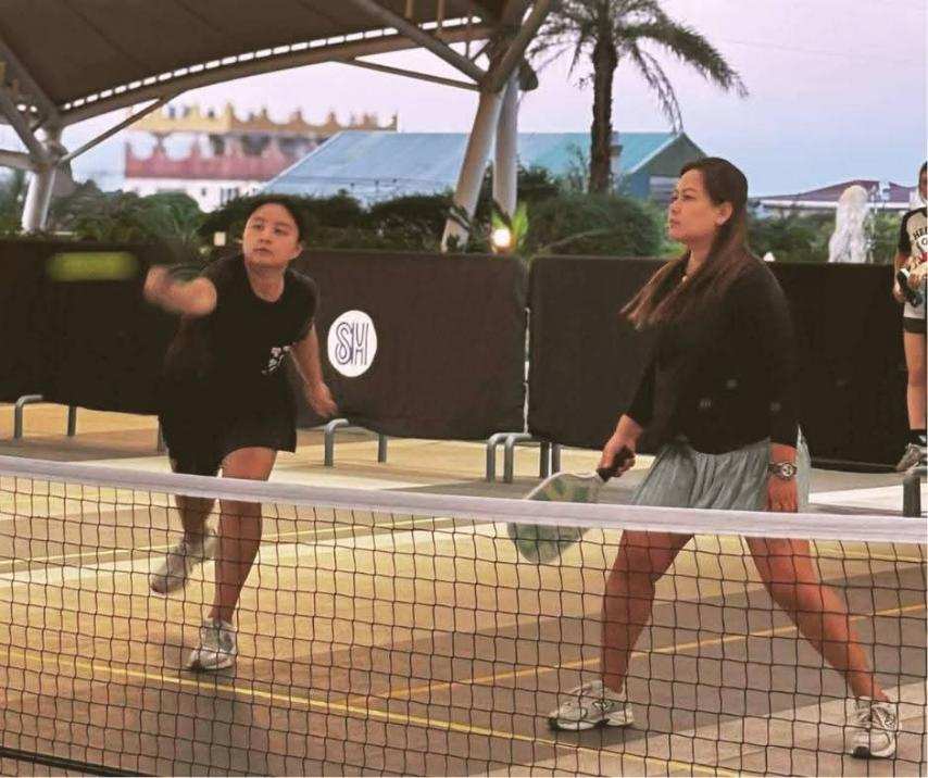 Players Enjoy An Exciting Game Of Pickleball At Sm City Cabanatuan, Showcasing Skill, Fun, And Friendly Competition.